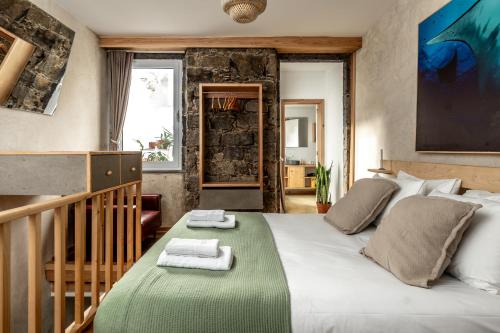 En eller flere senge i et værelse på Knock Knock II