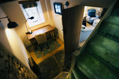 TV a/nebo společenská místnost v ubytování Rock cottage