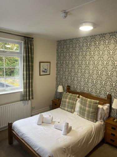 Una cama o camas en una habitación de Horton Inn
