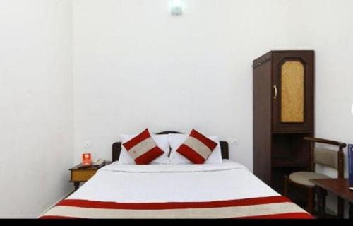 Postel nebo postele na pokoji v ubytování Hotel RJ INN
