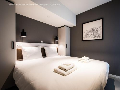 Katil atau katil-katil dalam bilik di YAYS Amsterdam East by Numa