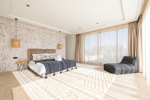 Postel nebo postele na pokoji v ubytování Villa 150 - Amelkis 2 avec piscine chauffée