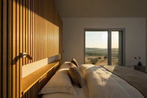 Postel nebo postele na pokoji v ubytování passa tempo Boutique Hideaway