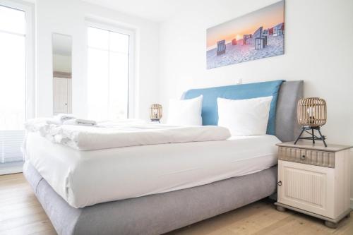 Postel nebo postele na pokoji v ubytování Strandhaus Zingst Apartment 03