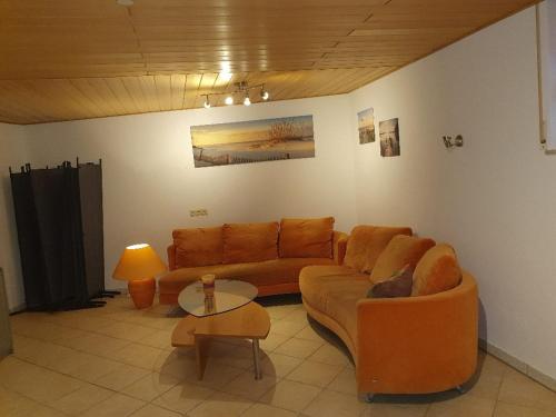 Zona de estar de Nice Apartment in Erlensee