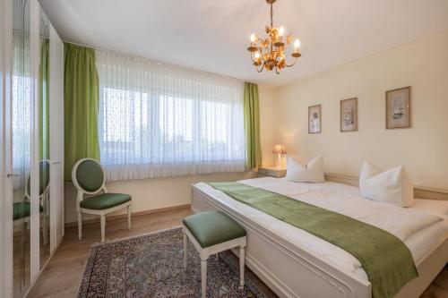 Postel nebo postele na pokoji v ubytování Reusenhof Am Haff