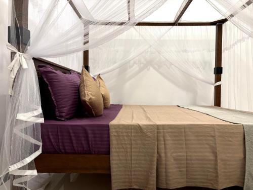 Postel nebo postele na pokoji v ubytování Heaven's Edge Lodge & Spa