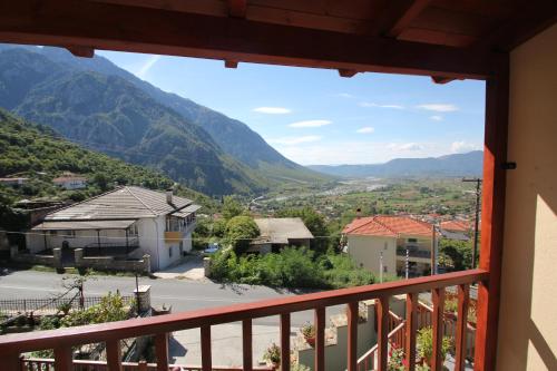 a view from a balcony with mountains in the background at Grand Hotel Dentro in Konitsa