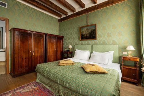 Postel nebo postele na pokoji v ubytování Relais Alberti