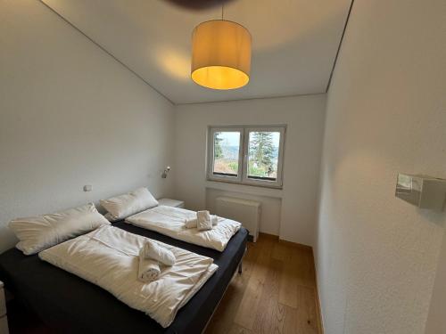 Ένα ή περισσότερα κρεβάτια σε δωμάτιο στο Ferienhaus 926