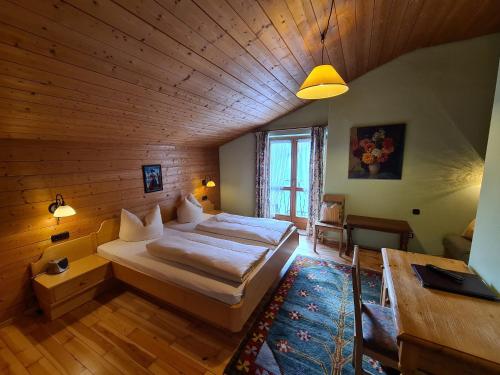 Postel nebo postele na pokoji v ubytování Hotel Altwirt