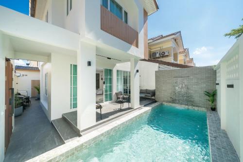 an image of a swimming pool in a villa at Patong private pool Villa 5BR 4Bath By MP property in Patong Beach
