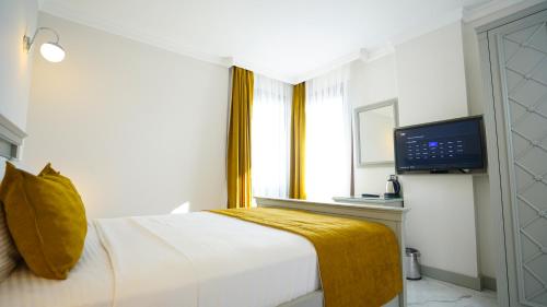 Postel nebo postele na pokoji v ubytování Cunda Say Resort