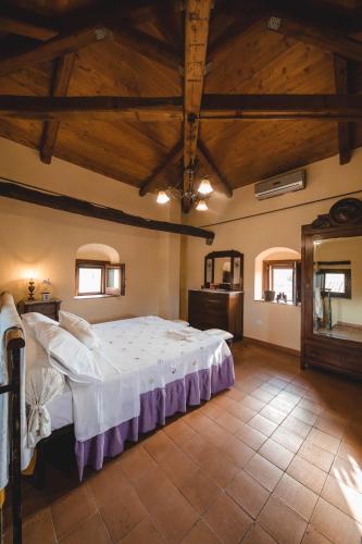 Postel nebo postele na pokoji v ubytování Agriturismo Villa Vittoria