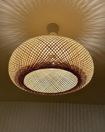 a ceiling light hanging from a ceiling at 富士の宿燦々 in Fujiyoshida