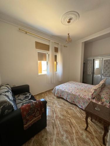Postel nebo postele na pokoji v ubytování Zohra chic