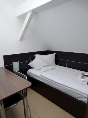 Ένα ή περισσότερα κρεβάτια σε δωμάτιο στο Prince Hotel