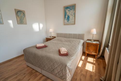 Postel nebo postele na pokoji v ubytování Zbirožský dvůr