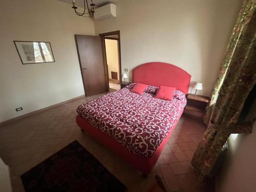 Ένα ή περισσότερα κρεβάτια σε δωμάτιο στο Agriturismo Pantano Borghese