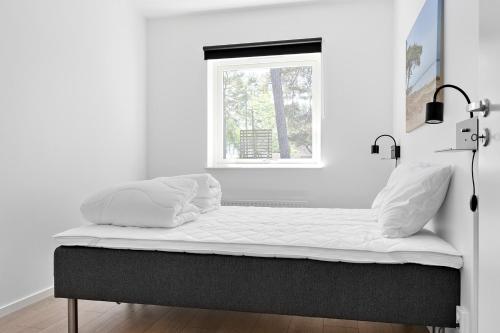 Postel nebo postele na pokoji v ubytování First Camp Åhus-Kristianstad