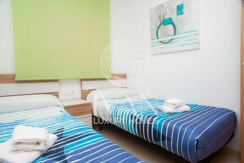 Posteľ alebo postele v izbe v ubytovaní Casa Azahar Ivan Luxury Homes 1ªPlta Norte 1ªLinea