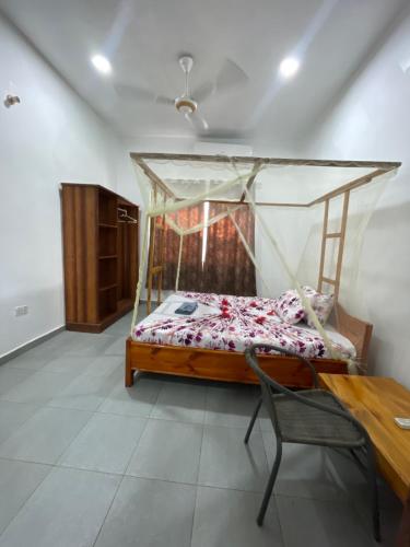 Ένα ή περισσότερα κρεβάτια σε δωμάτιο στο pole inn villa