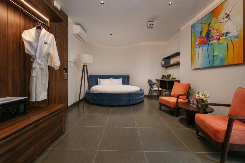 a hospital room with a bed and a table at Hanoi Riverview Boutique Hotel & Apartment in Hanoi