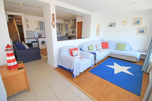 En eller flere senge i et værelse på Captain Jack's