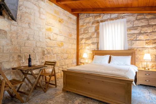 Postel nebo postele na pokoji v ubytování Via Maria Boutique Suites