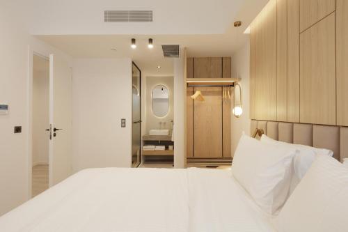 Cama o camas de una habitación en Hilton Garden Inn Athens Syggrou Avenue