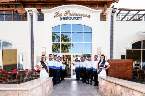 a group of people standing in front of a building at Xperience St. George Sharm El Sheikh in Sharm El Sheikh