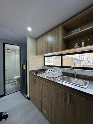 Kuchyň nebo kuchyňský kout v ubytování Hostelfc Loft 60