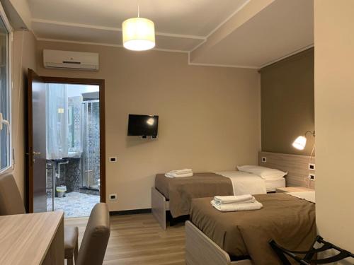 TV a/nebo společenská místnost v ubytování ALBERGO LOCANDA DIANA