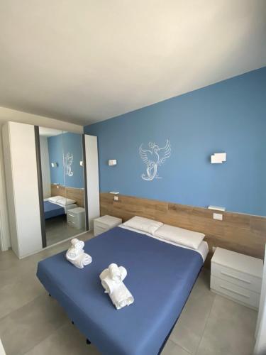 A bed or beds in a room at Fenice42