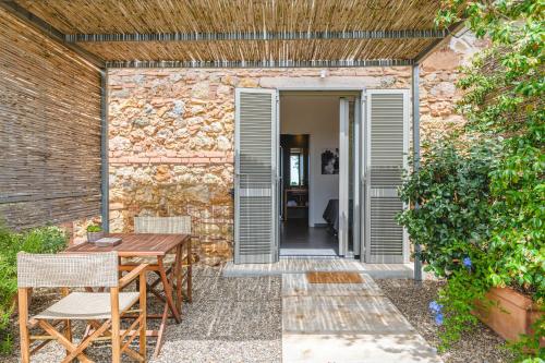 Patio o area all'aperto di Bio Agriturismo Corte degli Ulivi