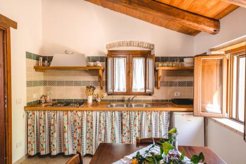 Kuchyň nebo kuchyňský kout v ubytování Agriturismo Villa Vittoria