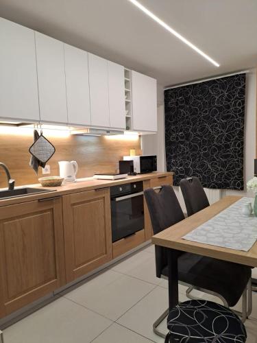 Η κουζίνα ή μικρή κουζίνα στο KM Art Apartman
