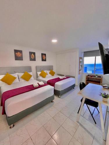 Postel nebo postele na pokoji v ubytování Apartamento hermoso en cartagena el laguito bocagrande con vista al mar