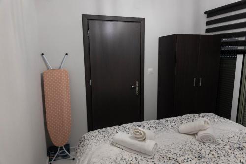 Postel nebo postele na pokoji v ubytování Comfortable Suites 2