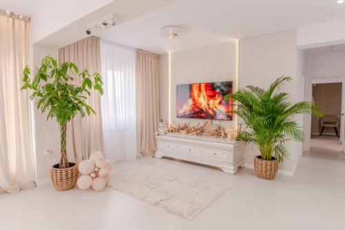 TV a/nebo společenská místnost v ubytování Penthouse View Aeroport Iasi 2