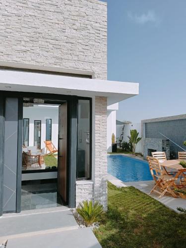 Πισίνα στο ή κοντά στο VILLA POOL Djerba Aghir AIR CONDITIONING - 5 BEDS