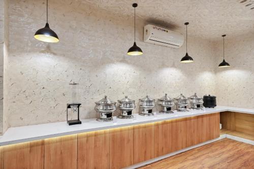 Příslušenství pro přípravu čaje a kávy v ubytování Hotel SM Deccan Park