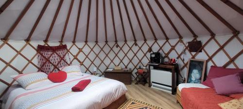 Katil atau katil-katil dalam bilik di Ecolodges en Provence