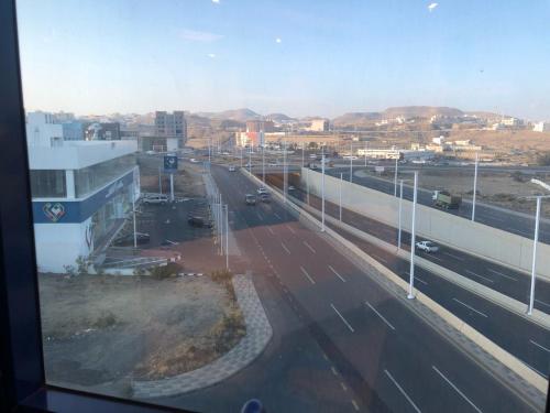 a view from a window of a highway with a city at شقق أروع القصور للشقق المخدومة in Abha