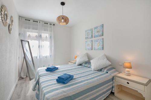 Ένα ή περισσότερα κρεβάτια σε δωμάτιο στο Apartamento San Telmo