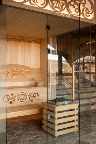 a glass room with a staircase in a room at Willa na Kozińcu in Zakopane