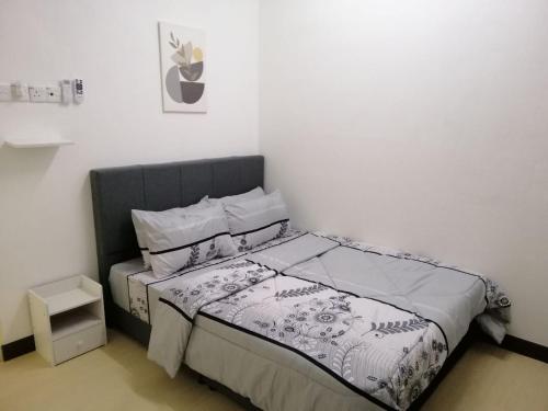 Postel nebo postele na pokoji v ubytování casa610 HOMESTAY PD