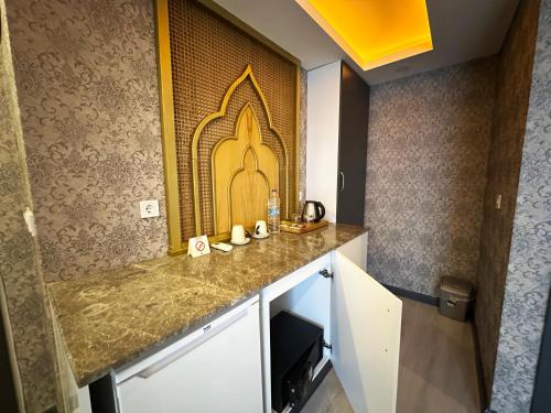 Kuchyň nebo kuchyňský kout v ubytování Akayda Butik Hotel