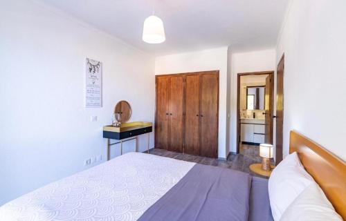 Ένα ή περισσότερα κρεβάτια σε δωμάτιο στο Sunset Apartament