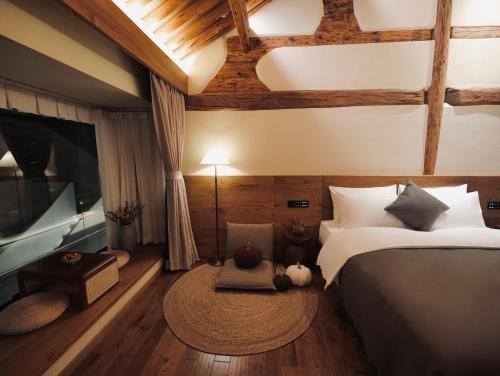 Letto o letti in una camera di Leisure Courtyard Seascape Designer Hotel